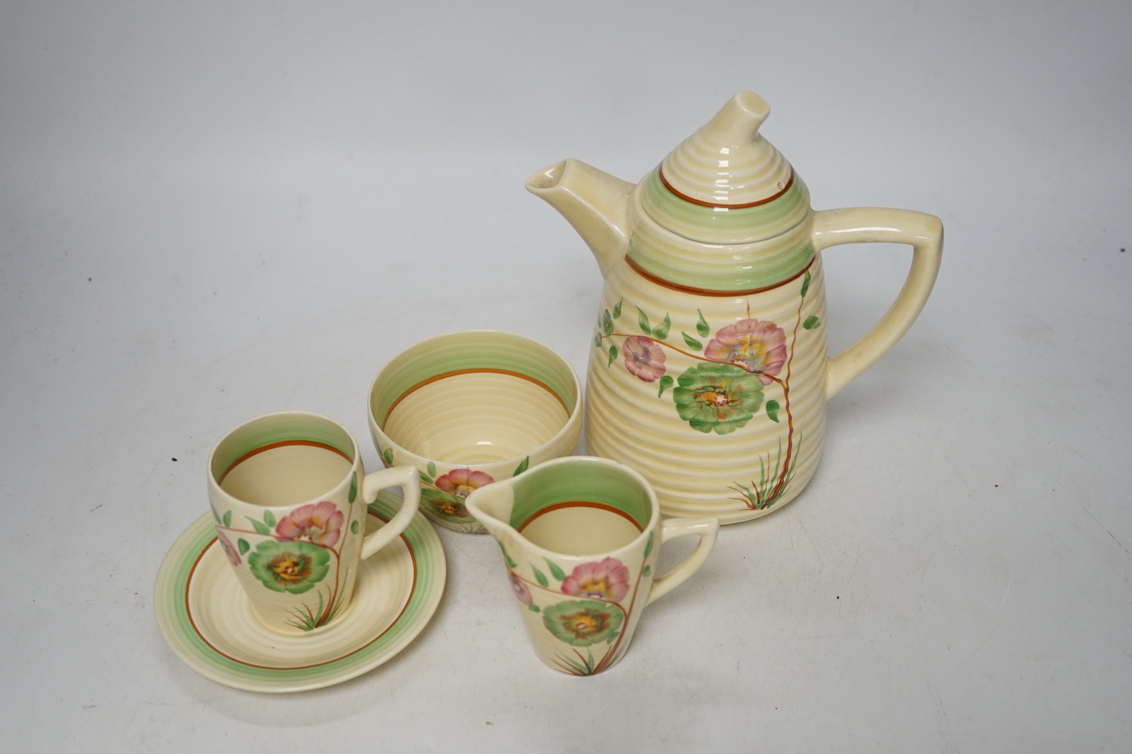 A Clarice Cliff Lynton shape coffee set, for six places, coffee pot 18cm high (9)